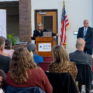 Emcee speaks to crowd at 2023 Years of Service ceremony